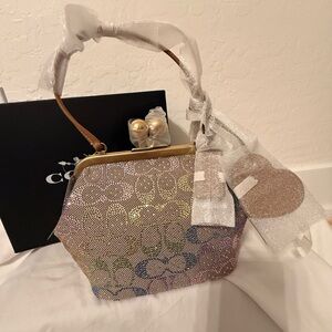 Kisslock Frame Bag 16
In Crystal Signature Jacquard